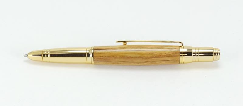 A gold plated Zephyr pen kit made from a whisky cask pen blank from the Blair Athol distillery
