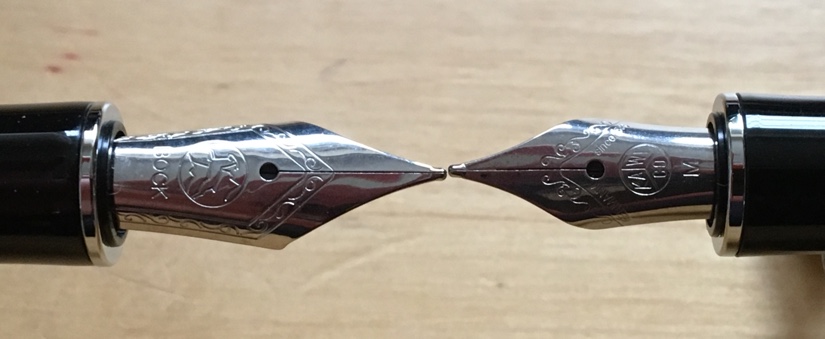 A Bock 076 fountain pen nib in a Kaweco Dia2 (left), compared to the original nib supplied with the pen (right)